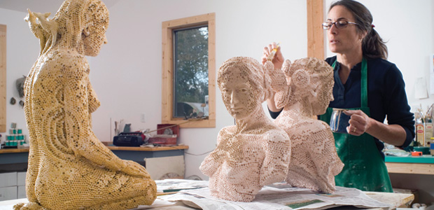 Andria Arleo working on a sculpture