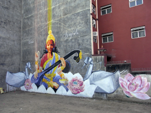 Collaboration mural with Dustin Spagnola of the goddess of education Saraswati at Trinity College Photo by DAAS