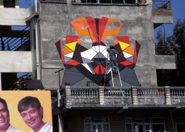 DAAS painting the Red Panda mural at Bagmati Bridge in Kathmandu Photo by Alok Serizawa Bastakoti