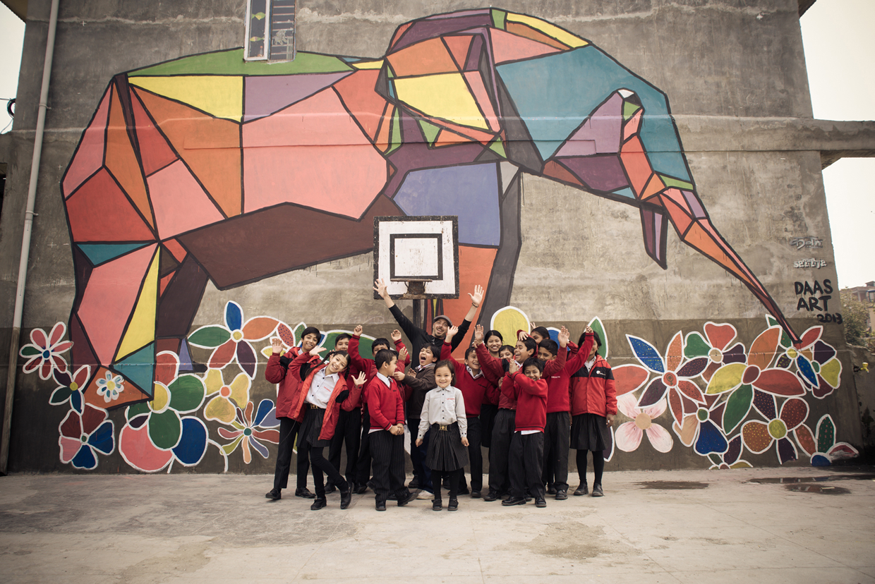 DAAS with students in front of Elephant mural at shikshantar school in Kathmandu Photo by Suraj Ratna Shakya