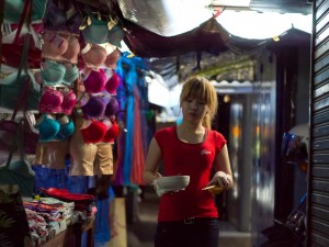 Street Photography in Phnom Penh, Cambodia by Tim Kelsall - woman in Psar Chas Old Market